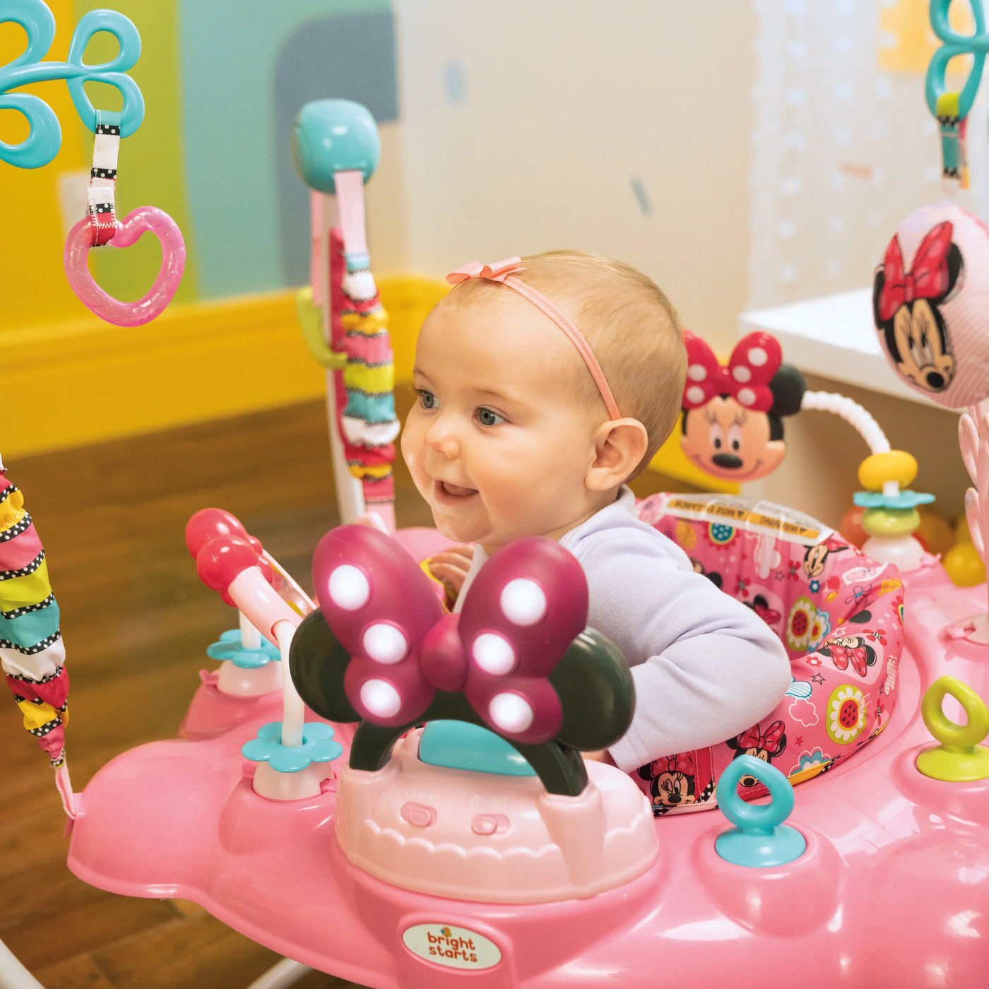 Bright Starts Disney Baby Minnie Mouse PeekABoo Activity Jumper Bouncer with Lights & Music, Age 6 months+